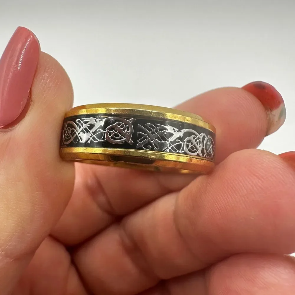 Men's size 12.5 yellow gold tone with black center/silver scroll work, ring!‎